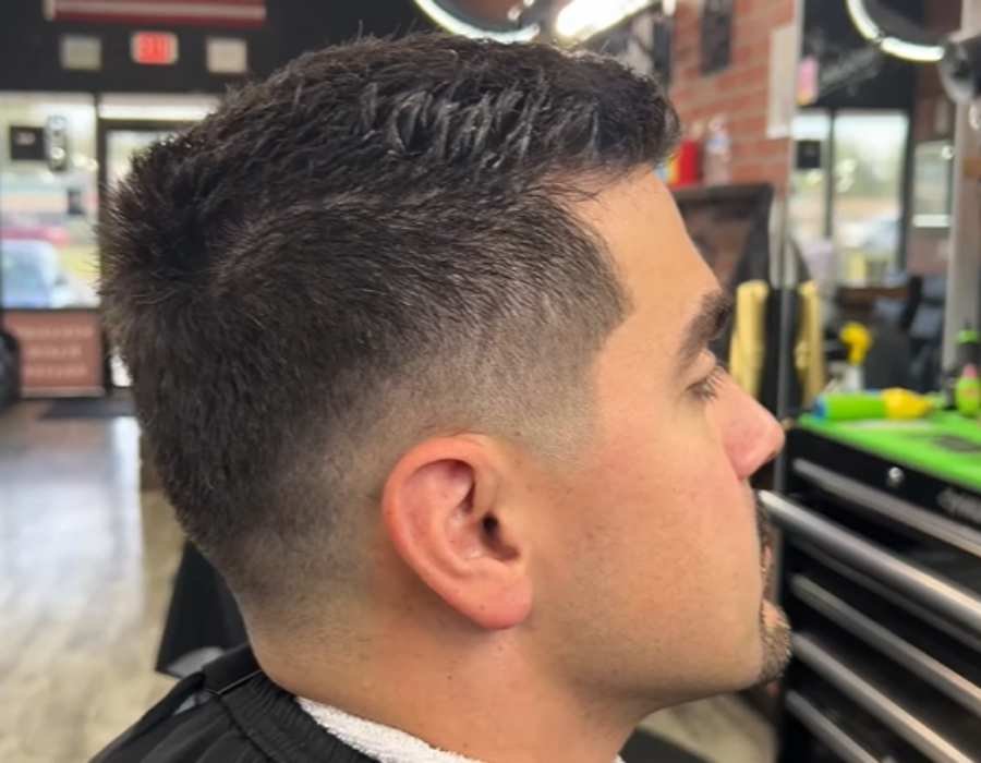 Low Taper Fade Faux Hawk hair style