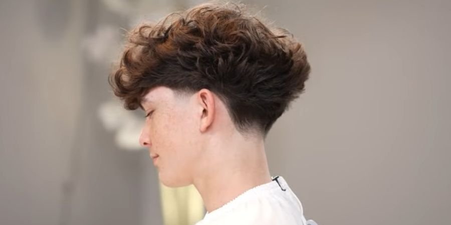 Low Taper Fade with Messy Waves hair style